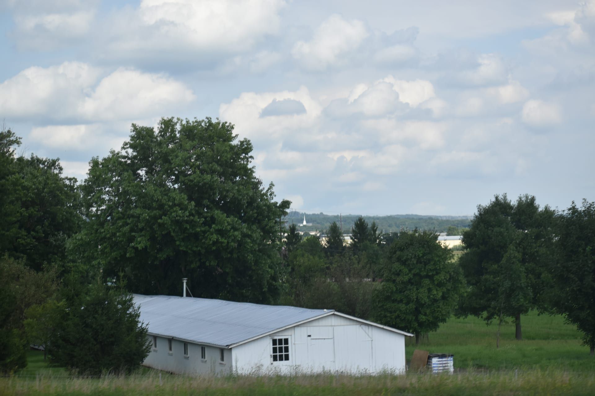 Rural barn in green countryside