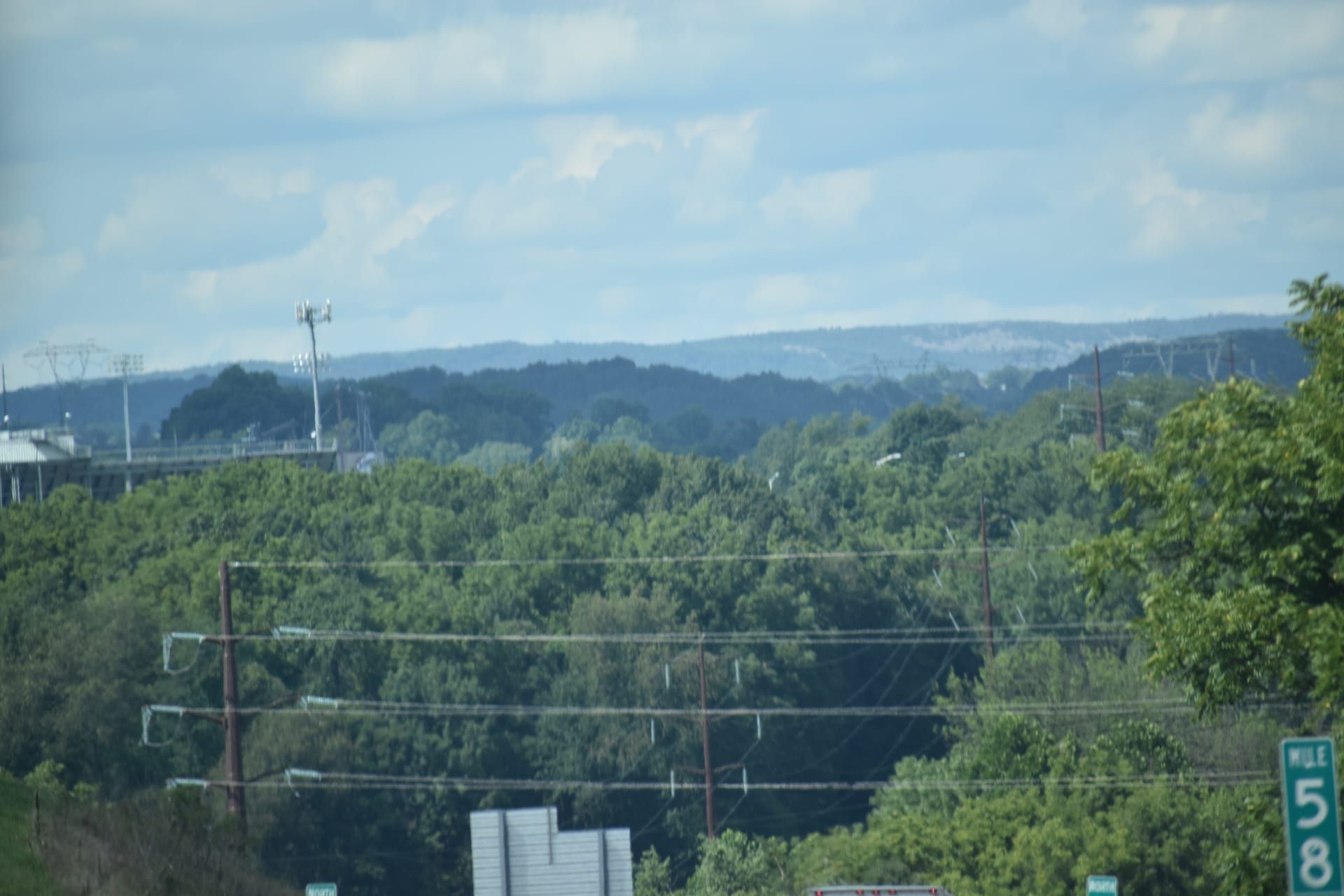 Rolling hills and distant mountains